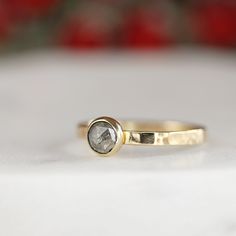 This beautiful natural rose cut salt and pepper diamond ring was made of 14k yellow gold comfort hammered band and 5 mm round rose cut salt and pepper diamond in 14k gold bezel setting. DETAILS ABOUT THE RING, MATERIAL AND STONES *** 5mm rose cut round salt and pepper diamond. *** 2 mm x 1mm 14k solid yellow gold band and bezel setting. *** Band is hammered. This diamond ring is perfect for wearing alone or mixing and matching with your other rings. This ring was handmade in Melt’m Jewelry Studi Handmade Diamond Ring, Salt And Pepper Diamond Ring, Pepper Diamond Ring, Diamond Stacking Rings, Hammered Band, Pepper Diamond, Body Glitter, Jewelry Studio, Salt And Pepper Diamond