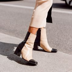 Color-blocked black and white ankle boots. Black And White Boots, Fall Boots Outfit, Winter Boots Outfits, Fall Leather, Black And White Heels, White Ankle Boots, Runway Shoes, Colour Theory, Fashion Festival