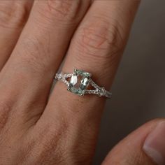 This is a gorgeous handmade creation. Its beauty is its simplicity & Elegance. The 6*8mm cushion cut natural green amethyst is crafted in sterling silver with rhodium plated. It's made to order and it will take about 7-10 days to make it. All item is sent in a beautiful gift box You can realize more lovely stuff clicking the link https://www.etsy.com/shop/knightjewelry?refshopsection_shophome_leftnav Please leave the correct address and you phone number for delivering successfully. Green Amethyst Rings With Gemstone Accents For Wedding, Green Emerald-cut Amethyst Ring For Wedding, Green Amethyst Wedding Rings With Gemstone Accents, Wedding Emerald Cut Green Amethyst Ring, Wedding Green Emerald Cut Amethyst Ring, Wedding Green Emerald-cut Amethyst Ring, Green Amethyst Rings For Wedding, Silver Cushion Cut Rings With Gemstone Accents, Elegant Green Amethyst Ring In Sterling Silver