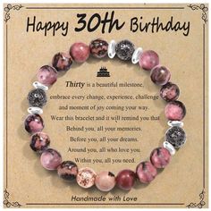 a birthday card with a bracelet made out of marbles and words that say, happy 30th