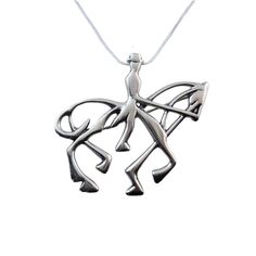 a silver necklace with an octopus on it