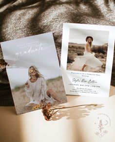 an open book with a photo on it next to a flower and a card that says graduate