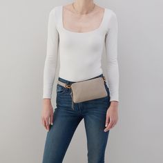 Go handsfree and travel light with the Fern Slim Belt Bag. Fern Slim Belt Bag In Pebbled Leather  Taupe BELT BAGSLING in Taupe | Hobo® Leather Mobile Phone Pouch For On-the-go, Versatile Shoulder Bag For On-the-go Travel, Versatile Belt Bag For On-the-go, Versatile Pouch With Adjustable Strap For On-the-go, Casual Textured Leather Bag For On-the-go, Chic Everyday Belt Bag With Adjustable Strap, Versatile Crossbody Belt Bag For Everyday Use, Everyday Crossbody Belt Bag With Removable Pouch, Versatile Everyday Crossbody Belt Bag