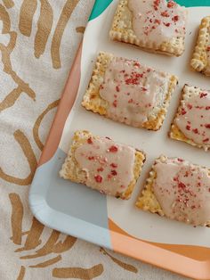 there are six crackers with icing on them