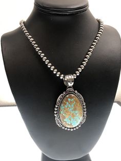 Masha Indian Native American Jewelry   -On Route 66 -         Albuquerque, New Mexico U.S.A     Item Specifics            Stone : Turquoise #8 Size : 20" Bead Size : 5mm Pendant Size : 2.75" Color : Blue Artisan : Harold Joe SKU : 11292 Free gift with Purchases (Till Stocks Last)  Genuine Sterling Silver Jewelry  This beautiful Necklace is made from all 925 Sterling Silver Beads and Findings.  These Beads are meticulously hand strung and assembled by the artist creating the perfect balance of fa Native American Turquoise Jewelry, Tube Necklace, Navajo Pearls, Silver Necklace Pendant, Silver Bead Necklace, Sterling Silver Necklace Pendants, Native American Jewelry, Blue Turquoise, Sterling Silver Bead