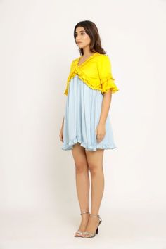 We are keen to introduce you to one of our exclusively picked brands from India - Neora by Nehal Chopra. The Hoppípolla Collection is a playful mix of color-blockings and variation in lengths and silhouettes. Read and see full collection here. Yellow-Ice Blue Mini Dress with Gathers and Frills in the Neck, Sleeves and Bottom. Fabric: Bemberg Modal Silk; woven via using Bamboo fabric on both the sides (Also known as Sustainable silk) Lining: Butter Crepe; Plant based with man made viscose The len Dress With Gathers, Frill Dress, Blue Mini Dress, Bamboo Fabric, Sustainable Clothing, Just The Way, Ice Blue, Dresses Xs, 3 Weeks