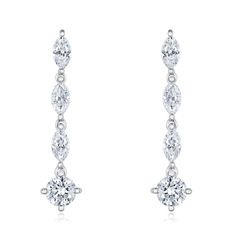 Add a dazzling measure of glamour to any ensemble with these beautiful drop earrings from the Roberta Z Classic Collection. Intricately crafted from 14k white gold, each lovely earring features 1 round and 3 marquise diamonds, the exquisite design exhibiting collective scintillation. The diamonds total 1ctw and are I in color and I1 in clarity. These earrings measure 20mm in length and 5mm in width. In every woman, there's a quiet confidence and an unshakeable sense of who she is. In every woman Elegant Marquise Platinum Earrings, Classic Platinum Dangle Bridal Earrings, Bridal Platinum Drop Earrings With Prong Setting, Platinum Bridal Drop Earrings With Prong Setting, Diamond Cut Cubic Zirconia Linear Drop Earrings, Cubic Zirconia Diamond Cut Drop Earrings, Elegant Platinum Drop Bridal Earrings, Elegant Platinum Bridal Drop Earrings, Elegant Sterling Silver Linear Earrings With Diamond Cut