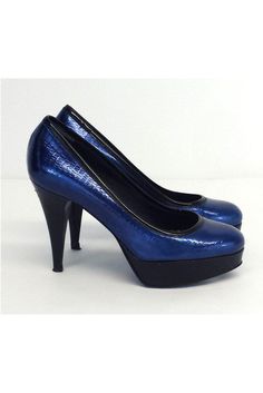 Size 6.5 EU 36.5 Midnight Blue Platform Heels Retails for $525 Made in Italy Comes with duster bag Leather soles Some wear on outer soles Leather lining Slitght wear on leather lining Very light wear on leather upper Padded insole Small mark on heel Platform height 1.25" Heel height 4.25" Blue Heels With Leather Sole For Work, Blue Leather Heels For Night Out, Blue Heels For Work, Blue Patent Leather Heels With Reinforced Heel, Luxury Blue Heels For Work, Blue Patent Leather Heels For Work, Blue Patent Leather Heels For Formal Occasions, Formal Blue Patent Leather Heels, Formal Blue Platform Heels