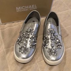 Girls Michael Kors Slip On Shoe. New, Never Worn Silver Slip-on Sneakers For Spring, Party Sneakers For Spring, Spring Party Sneakers, Trendy Michael Kors Sneakers For Spring, Silver Flat-heeled Sneakers For Spring, Spring Party Slip-on Sneakers, Silver Party Sneakers For Spring, Spring Silver Party Sneakers, Michael Kors Synthetic Sneakers For Spring