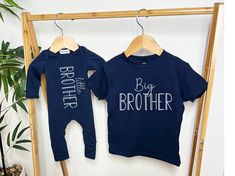 "This shirt is a stylish way to announce they are going to be the Big Brother! You can also choose to purchase the Little Brother on a navy romper/hat set, tee shirt or sweatshirt.  It coordinates nicely with our other sibling outfits or newborn outfits.  You can see them in links below. THIS LISTING IS FOR PURCHASING 1 SHIRT, SWEATSHIRT, BODYSUIT, ROMPER/HAT OR ROMPER/HAT/BLANKET SET AT A TIME.  PURCHASING MULTIPLE GARMENT INSTRUCTIONS ARE BELOW.  PURCHASING MULITPLE GARMENTS This listing is fo Blue Long Sleeve Top With Name Print, Family Matching Long Sleeve Custom Print T-shirt, Family Matching Long Sleeve Tops With Custom Print, Long Sleeve Tops With Letter Print, Customizable Long Sleeve Family Matching T-shirt, Family Matching Long Sleeve T-shirt With Text Print, Family Matching Long Sleeve Text Print T-shirt, Customizable Long Sleeve Tops For Family Matching, Graphic Print Long Sleeve Top