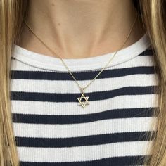 Please reference shipping & delivery 14k gold chain necklace 18k diamond Star of David charm 15-16" with jump ring at both lengths Lobster clasp closure Made to order. ** Please note, this piece is final sale.** **Please see Shipping & Returns** Gold Star-shaped Diamond Necklace Gift, Elegant Star Of David Charm Necklace With Delicate Chain, Sterling Silver Star Charm Necklace In Yellow Gold, Yellow Gold Sterling Silver Star Charm Necklace, Gold Star Of David Charm Necklace With Delicate Chain, Diamond Star Of David Necklace As Gift, Star-shaped Yellow Gold Jewelry With Adjustable Chain, Yellow Gold Star-shaped Jewelry With Delicate Chain, Yellow Gold Star Charm Pendant Necklace