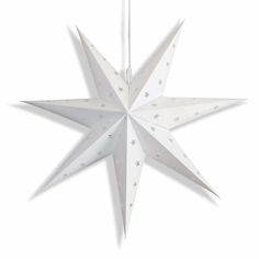 a white paper star hanging from a string