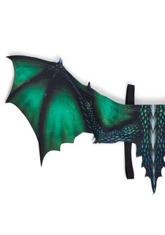 a green and black bat shaped object on a white background