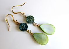 Fun colorful earrings featuring green teardrop glass beads hand wired to teal metal textured connector with quality gold headpins, eyepins, they are dangle on quality earwires. EARRINGS measure almost 2.5". Earrings Collection https://www.etsy.com/shop/minieglamstudio?section_id=7077498 Thanks for stopping by! If you need custom order, feel free to contact Minie Glam Studio. Have a nice day Green Beaded Dangle Teardrop Earrings, Bohemian Green Teardrop Drop Earrings, Earthy Green Dangle Earrings, Glam Studio, Green Czech Glass Drop Earrings, Green 14k Gold-filled Dangle Earrings, Metal Texture, Teardrop Beads, Colorful Earrings