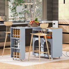 a kitchen with two stools and an island in front of the stove top oven