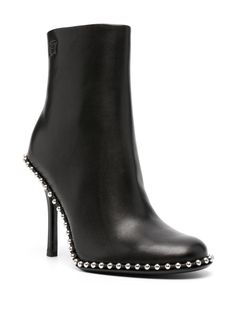 Luxury Studded Heeled Boots, Luxury Studded High Heel Boots, Leather High Heel Boots With Spikes, Spiked Leather High Heeled Boots, Formal Leather Heeled Boots With Studs, Studded Calf Leather Heels, Studded Round Toe Evening Boots, Designer High Heel Boots With Studs, Elegant High Heel Boots With Studded Outsoles