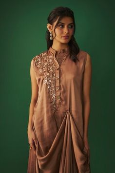 Beige sleeveless draped gown with rose applique, cutdana embroidery on yoke. - Aza Fashions Draped Gown, Drape Gowns, Rose Applique, Gown Pattern, Ladies Gown, Rose Embroidery, Satin Color, Mandarin Collar, Aza Fashion