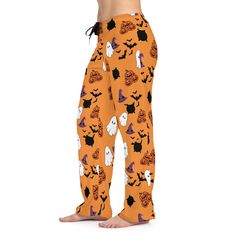 Women's Halloween Pajamas - Orange Fall PJ Pants, Spooky Family PJs, Halloween Sleepwear, Cozy Fall Clothes & Spooky Pajamas Product Details: Add custom style to any loungewear collection with these custom-printed pajama pants. Their 100% polyester jersey knit fabric, along with the relaxed fit, makes for the ultimate comfort choice while kicking back at home. Meanwhile, the back elastic with the drawstring tie creates the perfect fit while the all-over-print adds a stylish dimension unique to your taste.  - 100% polyester - White seam thread - Light fabric (6 oz/yd² (203 g/m - Relaxed comfort fit - Back elastic and black drawstring tie - Sewn-in care label - Assembled in the USA from globally sourced parts To purchase the product: If you have decided to purchase the product, you must firs Pjs Halloween, Spooky Pajamas, Womens Halloween Pajamas, Halloween Pjs, Sette Nani, Family Pjs, Printed Pajama, Halloween Pajamas, Boo Basket