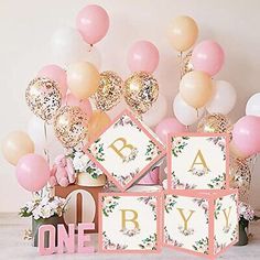 pink and gold baby shower decorations with balloons