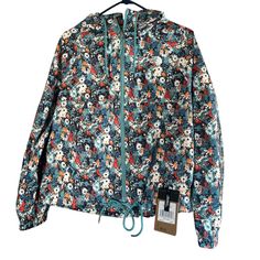 Brand New North Face Antora Rain Jacket Reef Water Wild Daisy Print Womens Size - Small Casual The North Face Windbreaker For Fall, Blue Spring Windbreaker For Outdoor, Blue Spring Outdoor Windbreaker, The North Face Long Sleeve Windbreaker For Spring, The North Face Spring Outdoor Outerwear, Casual Long Sleeve The North Face Windbreaker, The North Face Blue Windbreaker For Fall, Blue Casual Floral Print Outerwear, Casual Blue Floral Print Outerwear