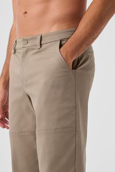 PSA: Alo makes more than performance pants. Like this easygoing cotton twill pair: They’re a touch structured, a touch stretchy, and look put together without much effort. They have classic design details (belt loops, pockets and slightly tapered legs) plus seamed panels on the legs for a fresh finish. All you have to do? Pick your favorite color and pair them with a plain tee. Alo Yoga 4-way Stretch Elastane Bottoms, Versatile Alo Yoga Bottoms, Versatile Solid Color Alo Yoga Bottoms, Casual Alo Yoga Straight Pants, Alo Yoga Solid Color Pants With Pockets, Alo Yoga Solid Pants With Pockets, Chino Cotton Twill Bottoms With Belt Loops For Workwear, Chino Cotton Twill Workwear Bottoms With Belt Loops, Alo Yoga Elastane 4-way Stretch Bottoms