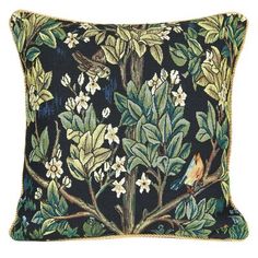 an embroidered pillow with birds and flowers on black background, the image shows a bird perched on a tree branch