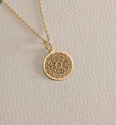 14K Real Solid Gold Mandala gold necklace ● Material of pendant: Solid Gold 14k ( REAL GOLD ) ● Metal Stamp: 14L ( REAL GOLD ) ● The pendant is available in 6 sizes: - 14,0 mm / 0,55 inches ( Diameter ) In the photos - 15,3 mm / 0.60 inches ( Diameter ) - 16,5 mm / 0,65 inches ( Diameter ) - 19,1 mm / 0,75 inches ( Diameter ) - 21 mm / 0,82 inches ( Diameter ) - 23 mm / 0.90 inches ( Diameter ) ( In the photos the size is 14mm / 0.55 inches Diameter ) ( Jump Ring inner diameter: 4 mm ) ● Materia Cheap Spiritual Yellow Gold Jewelry, 14k Gold Medallion Amulet Jewelry, Yellow Gold Plated Spiritual Necklace, Spiritual Yellow Gold-plated Necklaces, Spiritual Yellow Gold Plated Necklaces, Spiritual Recycled Gold Round Pendant Jewelry, 14k Gold Filled Yellow Gold Charm Necklace For Anniversary, Gold Sterling Silver Spiritual Jewelry, 14k Gold Filled Medallion Jewelry