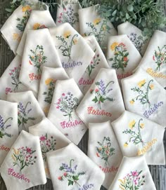 embroidered tea towels with flowers on them