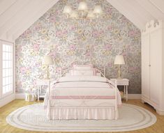 a white bed sitting in a bedroom next to a wallpaper covered with pink and yellow flowers