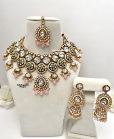 Premium quality Kundan Necklace comes with elegant Jhumki Earrings and Tikka/ Indian Jewelry/Premium Quality Polki and Kundan Jewelry/pink      All items are shipped from Brampton, Ontario, Canada. If you need your item by a certain day, please reach out to us for express delivery option before placing the order so that we can update the shipping for you. Standard shipping/delivery timeline Below are the delivery timeline estimates. We dispatch all orders by the next business day. ---> USA deliv Pink Chandbali Kundan Necklace For Wedding, Bollywood Pink Bridal Necklace For Reception, Bollywood Style Pink Bridal Necklace For Reception, Heavy Pink Bridal Necklace For Diwali, Pink Kundan Jewelry Sets, Pink Kundan Necklace For Festivals, Pink Kundan Necklace With Stone Work For Wedding, Pink Kundan Wedding Necklace With Stone Work, Pink Round Kundan Necklace For Diwali