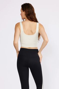 A minimalist must-have, monochrome full coverage tank top, with scoop neck, square back, built-in bra with removable pads, tonal logo on center back. Pair with matching Hana leggings or Drew biker shorts for a set look. Medium support for active and street. Materials & Care Composition: 75% Nylon, 25% Spandex. Machine wash cold with like colors, do not bleach, wash inside out. Hang or lay flat to dry, do not tumble dry. Do not dry clean. Bra Tank, Bleach Wash, Womens Activewear, Biker Shorts, Lay Flat, Must Haves, Scoop Neck, Inside Out, Bleach