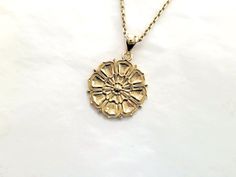 women's and men's buddhist lotus flower necklace pendant 1 made in 14k solid gold or 18k solid gold buddhist lotus flower with exquisite detail is designed as a relief. - model wears a 2.1mm 50cm chain. - free shipping on all orders - designed by carre d'or - made in south korea 14k gold lotus flower pendant necklace 1 weight pendant only 6.71g (±3%) with a 2.1mm 42cm chain 12.67g (±3%) with a 2.4mm 42cm chain 14.54g (±3%) with a 3.0mm 42cm chain 18.29g (±3%) 18k gold lotus flower pendant neckla Spiritual 14k Gold Medallion Jewelry, 14k Gold Pendant Medallion Necklace, Traditional Tarnish Resistant Pendant Jewelry, Spiritual Yellow Gold Medallion Necklace With Large Pendant, White Gold Jewelry With Large Flower Pendant, Traditional Pendant Necklace Tarnish Resistant, Amulet Style Yellow Gold Flower Pendant Jewelry, Yellow Gold Amulet-style Flower Pendant Jewelry, Spiritual 14k Gold Round Medallion Necklace