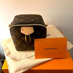 Just In Case Louis Vuitton. New. Box, Bag, Duster Bag Included. Adorable This Bag Was Featured On The Runway For Spring 2024. Formal Monogram Canvas Box Bag With Dust Bag, Luxury Monogram Canvas Shoulder Box Bag, Luxury Monogram Canvas Box Shoulder Bag, Luxury Monogram Canvas Crossbody Box Bag, Luxury Bucket Box Bag With Gold-tone Hardware, Designer Monogram Canvas Box Bag With Removable Pouch, Luxury Shoulder Bag In Monogram Canvas With Original Box, Luxury Monogram Canvas Shoulder Bag With Original Box, Luxury Monogram Canvas Top Handle Box Bag