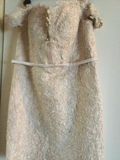 "Beige evening dress for a formal event. Dress size not attached . Measurements hips  36\" around, waist 34\" around , length 32\". Absolutely stunning vintage dress like new. Silk lining lace attached belt and laces up the back.scalloped hem and cuff arm sleeves. Look closely a this very special dress. . Couture unmarked dress. Like new likely never worn." Beige Evening Dress, Dress Couture, Special Dress, Event Dress, Arm Sleeves, Special Dresses, Crystal Stars, Arm Sleeve, Scalloped Hem