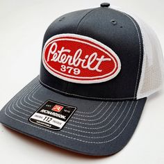 The Peterbilt 379 Trucks Retro Vintage Style Patch Trucker Hat Is A Must-Have For Any Truck Lover. This Hat Features An Embroidered Patch Of The Iconic Peterbilt 379 Truck On The Front. The Richardson 112 Trucker Style Hat Is Made With A Comfortable And Breathable Mesh Back And Adjustable Snapback Closure For A Secure Fit. The Blue Collar Color Scheme Gives It A Classic, Retro Vibe That Will Never Go Out Of Style. Perfect For Outdoor Activities Or Everyday Wear, This Hat Will Keep You Looking Co Truck Lover, Welding Hats, Denim Aesthetic, Peterbilt 379, Aviator Hat, Vintage Trucker Hats, Peterbilt Trucks, Mens Beanie, Retro Vintage Style