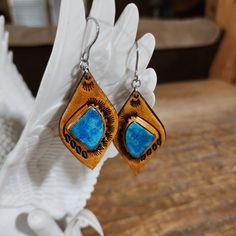 Bohemian Hand-tooled Leather Earrings, Hand Tooled Leather Earrings For Gift, Hand Tooled Leather Earrings As Gift, Hand Tooled Leather Drop Earrings, Artisan Leather Nickel-free Earrings, Handmade Leather Teardrop Earrings, Handmade Leather Dangle Earrings, Leather Earrings As A Gift, Bohemian Turquoise Leather Earrings