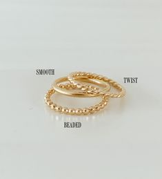 "A curated set of simple gold bands to elevate your ring stack. Handmade in high-quality 14k gold fill so you never have to take them off. (These rings are all sold separately in my shop if you want just 1 band) ＤＥＴＡＩＬＳ: Select your combination from the drop-down menu (see last photo above for labeled styles) 14k Gold Filled - tarnish-proof / water-proof Each band is 2 mm in width ＳＩＺＩＮＧ: Handmade to order in your size Select your ring size on the drop down menu (True to size) ABOUT GOLD FILL: W 14k Gold Filled Dainty Everyday Rings, Dainty 14k Gold Filled Rings For Everyday, Delicate Hypoallergenic 14k Gold Midi Rings, Everyday Simple Stackable Rings In 14k Gold Filled, Everyday Stackable 14k Gold Filled Rings, Everyday 14k Gold Filled Tarnish Resistant Rings, Everyday Simple 14k Gold Filled Stackable Rings, Adjustable 14k Gold Midi Rings For Everyday, Everyday Tiny Stackable Rings In 14k Gold