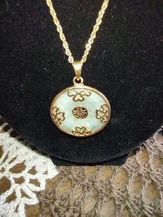 Oval Jade Necklaces With Hallmark, Formal Jade Necklace With Round Pendant, Hallmarked Oval Jade Necklaces, Vintage Jade Round Pendant Jewelry, Antique Engraved Jade Jewelry, Vintage Jade Gemstone Jewelry, Antique Jade Jewelry Collectible, Antique Round Jade Jewelry, Vintage Jade Pendant Jewelry