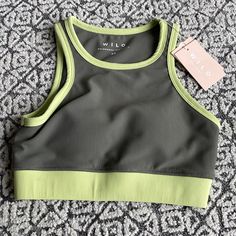 Brand New Wilo The Label Sports Bra! Padded (Removable) Great Color! Green Bra-friendly Athleisure Tank Top, Green Bra Friendly Athleisure Tank Top, Green Athleisure Tank Top Bra Friendly, Green Athleisure Tank Top, Bra Friendly, Green Racerback Sports Bra For Light Sports, Spring Green Racerback Activewear, Stretch Sleeveless Color Block Activewear, Green Racerback Activewear For Light Sports, Fitted Green Sports Bra For Spring