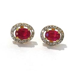 This is part of Chairish’s Fine Jewelry assortment.  Natural red ruby, oval shape - 2 carats Natural gray single cut diamonds - 1 carat   The earrings from the "Orient" traveling collection are the epitome of elegance and versatility. They offer a perfect blend of day to night and swimwear to evening wear, allowing you to effortlessly transition between different occasions and outfits. Wearing these spectacular drop oriental-style earrings will undoubtedly make you the center of attention. They Luxury Oval Ruby Earrings, Formal Ruby Gemstone Diamond Earrings, Ruby Gemstone Diamond Earrings For Formal Occasions, Ruby Brilliant Cut Fine Jewelry Earrings, Ruby Earrings With Brilliant Cut In Fine Jewelry Style, Fine Jewelry Ruby Earrings With Brilliant Cut, Ruby Earrings Brilliant Cut Fine Jewelry, Red Brilliant Cut Fine Jewelry Earrings, Ruby Diamond Earrings In Fine Jewelry Style