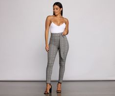 Look posh and poised in these chic plaid tie waist skinny pants! They feature a high rise waist with a tie front detail and a flattering skinny leg fit. Wear them to the office and you can easily transition them for happy hour afterward. Pair with a cute blouse and classic block heels.Fit & Features High rise waist Tie front accent Back zipper closure Skinny leg fit Plaid print Model is 5'7" with a 34" bust. 24" waist and 36" hips. She is wearing a size small. Trendy Tie Waist Workwear Bottoms, Trendy Workwear Bottoms With Tie Waist, Chic Fitted Pants With Tie Waist, Chic Plaid Bottoms For Business Casual, Fitted Pants With Tie Waist For Workwear, Fitted Tie Waist Pants For Work, Fitted Work Pants With Tie Waist, Elegant High-waisted Plaid Pants, Chic High-waisted Plaid Pants