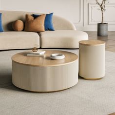 The Modern Round Coffee Table is an accent table with striped columns on the side. The side feature gives the coffee table a modern look and will beautify any space it is set in. It also features two hidden drawers that provide more storage space for your possessions. This Modern Round Coffee Table with Hidden Drawers offers a unique modern presence with rich, natural soft shapes. This makes it ideal for larger living rooms and offices too.  It p Small Beige Coffee Table, Modern Style Coffee Table, Ribbed Coffee Table, Nest Of Tables Living Room, Modern Coffee Tables Living Rooms, Side Table Styling Living Room, Small Coffe Table, Coffee Table For Bedroom, Japandi Table