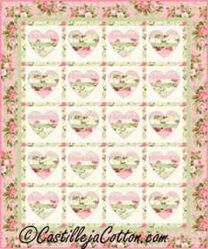 a quilt with hearts on it in pink and green colors, as well as the words love