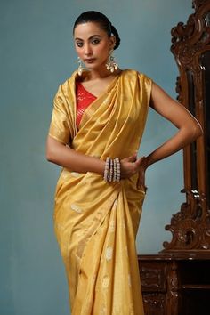 Light yellow gold handwoven saree crafted in kosa silk featuring flower and leaf motif. Comes with a running blouse piece. - Aza Fashions Festive Gold Pre-draped Cotton Silk Saree, Gold Cotton Silk Pre-draped Saree, Gold Pre-draped Saree With Cutdana For Navratri, Traditional Gold Pre-draped Saree For Navratri, Gold Pre-draped Saree With Cutdana In Traditional Drape, Navratri Gold Chanderi Pre-draped Saree, Gold Pre-draped Saree With Dupatta In Cotton Silk, Gold Pre-draped Saree For Navratri Designer Wear, Gold Pre-draped Saree With Unstitched Blouse For Designer Wear