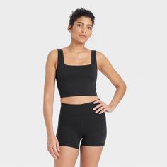 Women's Seamless Square Neck Crop Tank Top - All In Motion™ Seamless Medium Support Solid Tank Top, Seamless Solid Tank Top With Medium Support, Solid Cropped Seamless Tank Top, Solid Color High Stretch Tank Activewear, High Stretch Solid Color Tank Activewear, Seamless Medium Support Crop Tank Top, Solid Medium Support Cropped Top, Black Fitted Seamless Fabric Crop Top, High Stretch Solid Color Seamless Tank Top