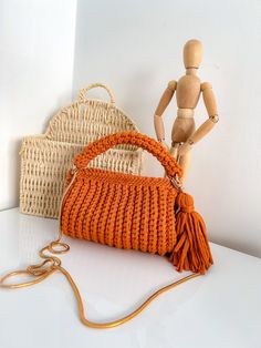 Small orange handbag for those who love a cute accessory for a summery day out! Metal fittings are removable and all bags come with a free mirror! Choose your preferred color from our T-Shirt Yarn pallet. Dimensions: Height: 16cm Length: 19cm Width: 5cm RULES FOR THE CARE: -Do not wash, -do not iron, -do not wet it too much. -Clean with a damp sponge. Casual Orange Crochet Bag For Everyday, Handmade Orange Crochet Bag For Daily Use, Orange Crochet Bag For Everyday Use, Handmade Orange Crochet Bag For Summer, Everyday Rectangular Orange Crochet Bag, Crocheted Handbags, Pallet Dimensions, Crochet Orange, Orange Handbag