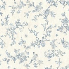 a blue and white wallpaper with flowers on it