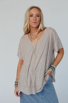 Excited to bring you the Nestled In Ribbed Knit Top from our exclusive collection; The Nest by Three Bird Nest. Check out the rest of the collection here - Inspired by you, created by us. Comfortable, stretch, ribbed knit fabric Relaxed and loose pullover tee silhouette Flattering v - neckline and dropped shoulders with loose short sleeves Exposed seams throughout for added boho style Pair with: Evermore Seamless Lace Racerback Bralette, The Signature Flare and Color Burst Mix Bead Bracelet. *Du V-neck Pointelle Knit Tops For Loungewear, Cozy Fine Knit V-neck Tops, Beige Ribbed V-neck Top, Beige Knit Top For Loungewear, Cozy V-neck Fine Knit Tops, Relaxed Fit V-neck Pointelle Knit Top, Beige V-neck Pointelle Knit Top, Relaxed Ribbed Top For Fall, Relaxed Ribbed Fall Tops