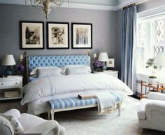 the bedroom is decorated in blue and white