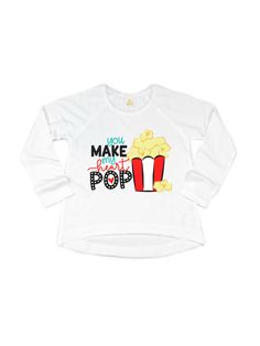 Girls Valentine's Day Shirt Pop, pop, hooray! Our Girls Valentine's Day Shirt is here to add a dash of fun to the celebration. With an adorable 'You Make my Heart Pop' design, this shirt is popping with love and style. A playful choice for your little popcorn lover! 🍿💖 Details 100% cotton white; short + long sleeve lengths unisex, kids fit heat transfer apparel decorating method made in Philadelphia, PA by a certified woman-owned, black-owned, small business Processing Time Orders are processe White Pop Culture Slogan Tops, White Pop Culture Tops With Slogan, White Pop Culture Slogan Top, Fun Long Sleeve Slogan T-shirt, Fun Long Sleeve Slogan Tops, Playful Crew Neck Top For End Of School Year, Cute Graphic Print Top For Birthdays, Playful White Top With Text Print, Cute Long Sleeve Tops With Funny Text